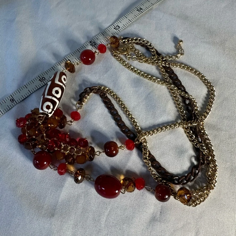 Long goldtone sparkly statement necklace